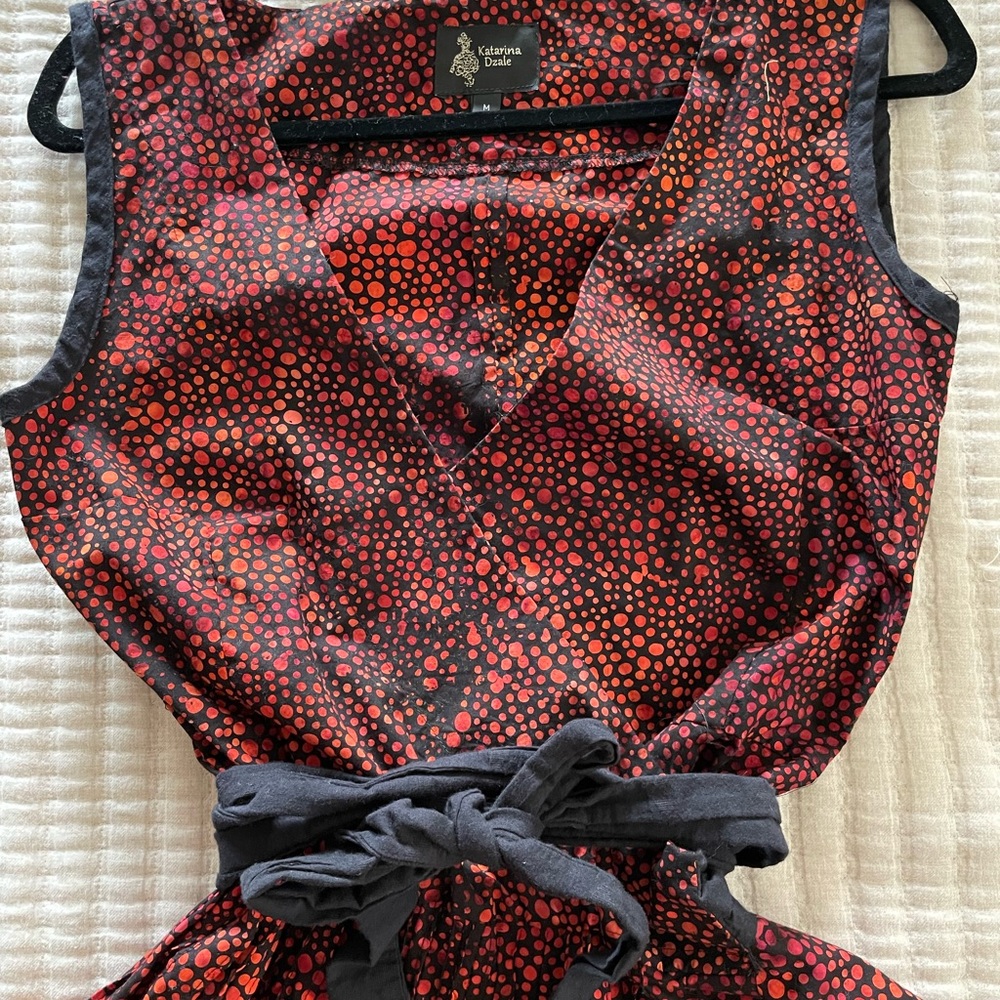 This beautiful dress is elegant & unique.